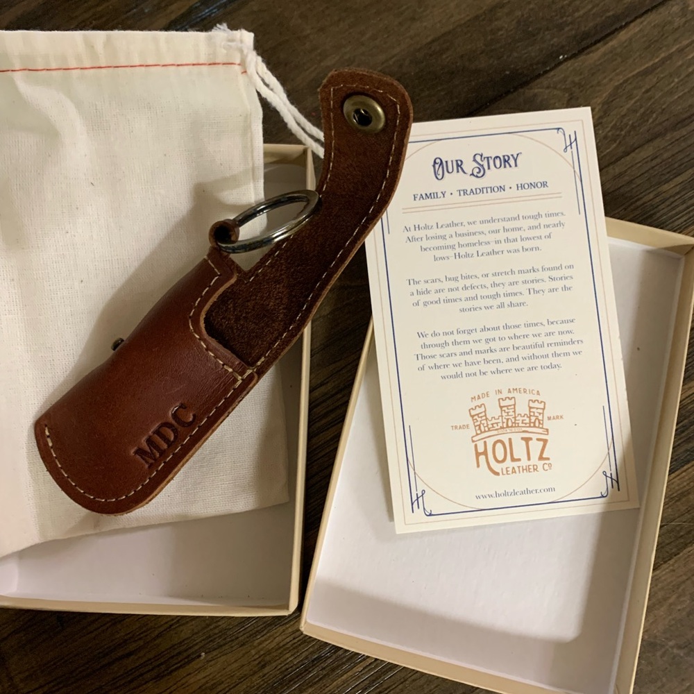 Holtz Genuine leather monogrammed lipbalm holder.